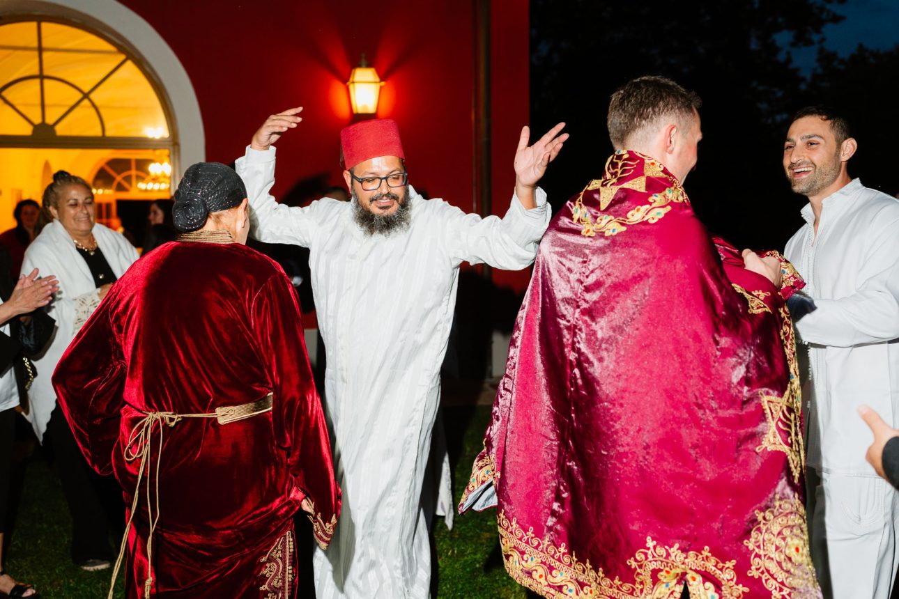 Guests celebrating Henna Party luxury Jewish wedding Tuscany
