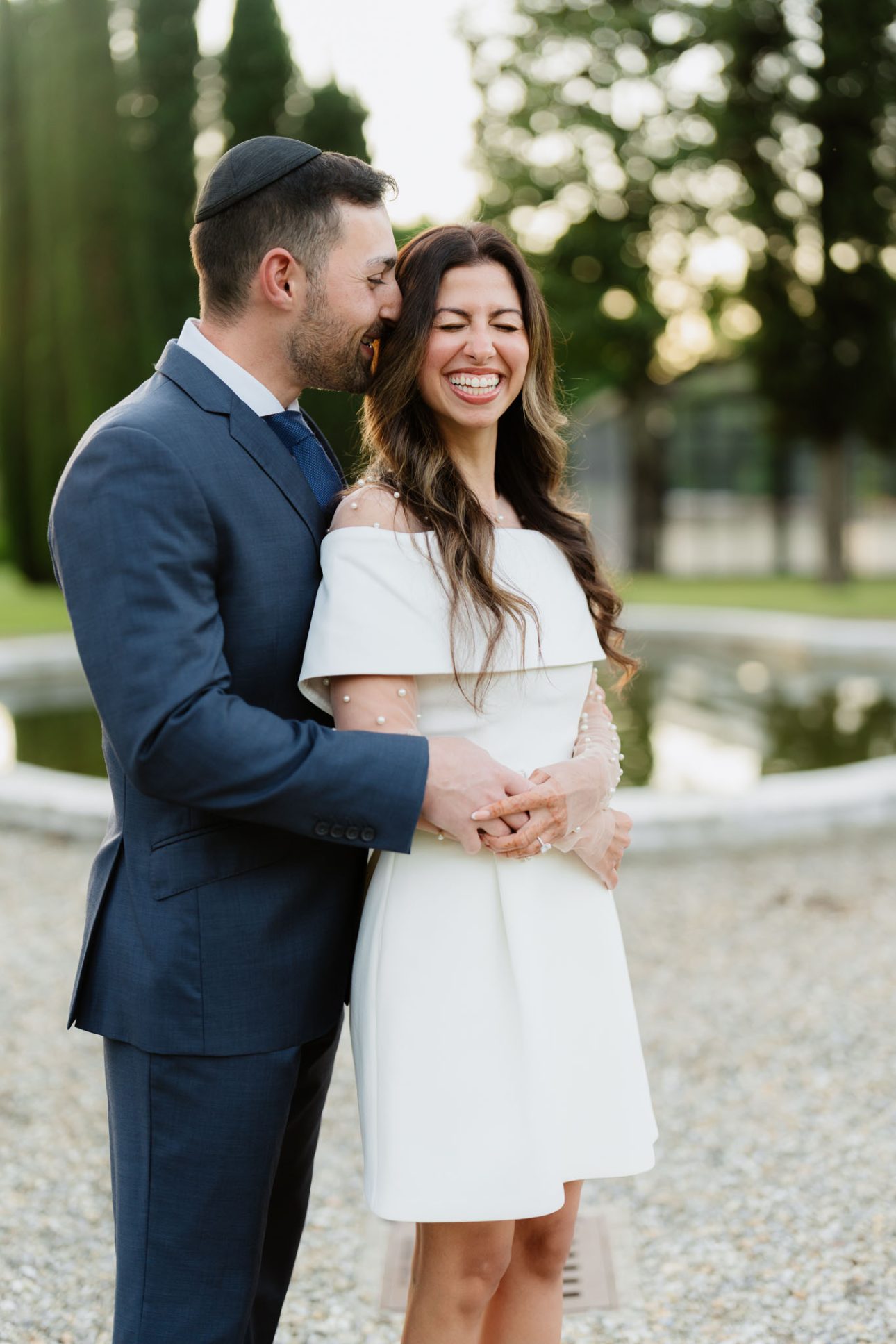 Sunset couple portrait with Tuscan hills luxury Jewish Wedding Tuscany