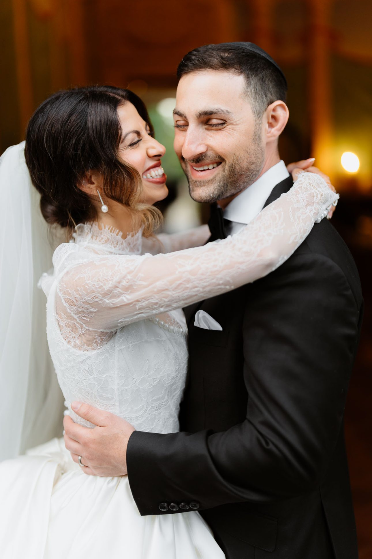 Emily and Refael candid laughter portrait Tuscany